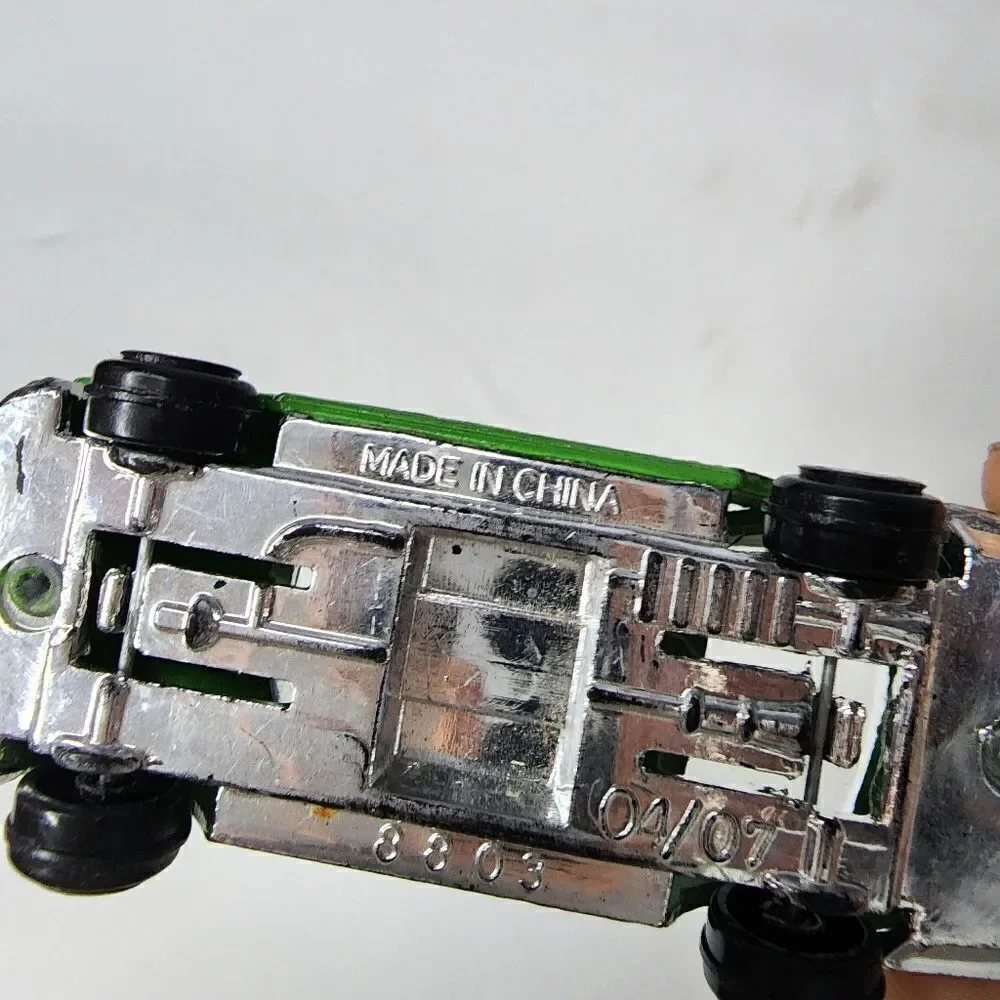 MERCEDES-BENZ 500 SEC  number 8803 can be found on inside Green Race Car #55